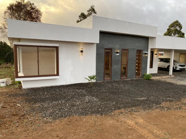 PARCELA CON CASA 4D 2B