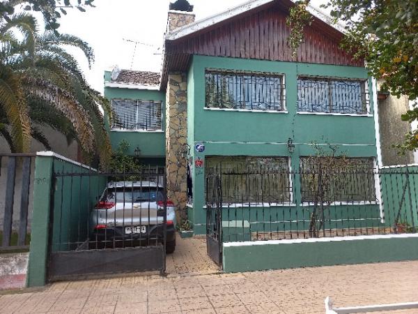 V 1385-LR-CASA CENTRAL  EN CURICÓ