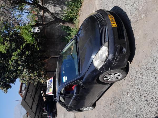 TAXI COLECTIVO NISSAN TIIDA