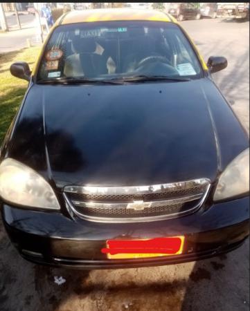 VENDO TAXI BASICO 2011  LICITADO AL DIA 