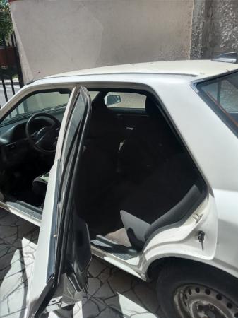 VENDO MAZDA 323 SIN MULTA TOTALMENTE TRANSFERIBLE