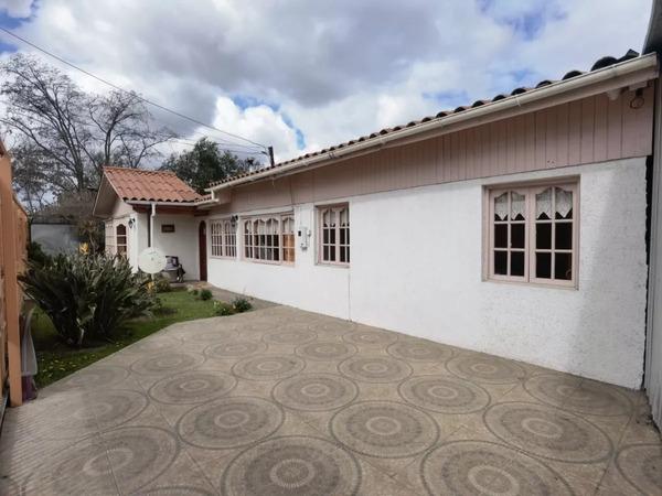 PROPIEDAD CON CASA CENTRO