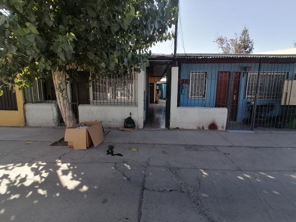 TERRENO CON 4 DEPARTAMENTOS 