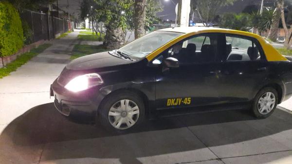 TAXI NISSAN TIIDA 2014 CON DERECHOS TRABAJANDO 