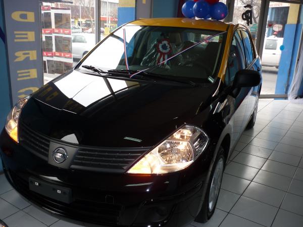 TAXIS OKM VERSA,C/N/PATENTE/VIDRIO